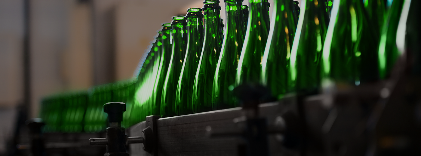 Many bottles on conveyor belt