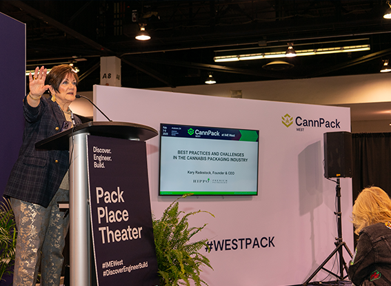 Conference speaker delivering a presentation at CannPack